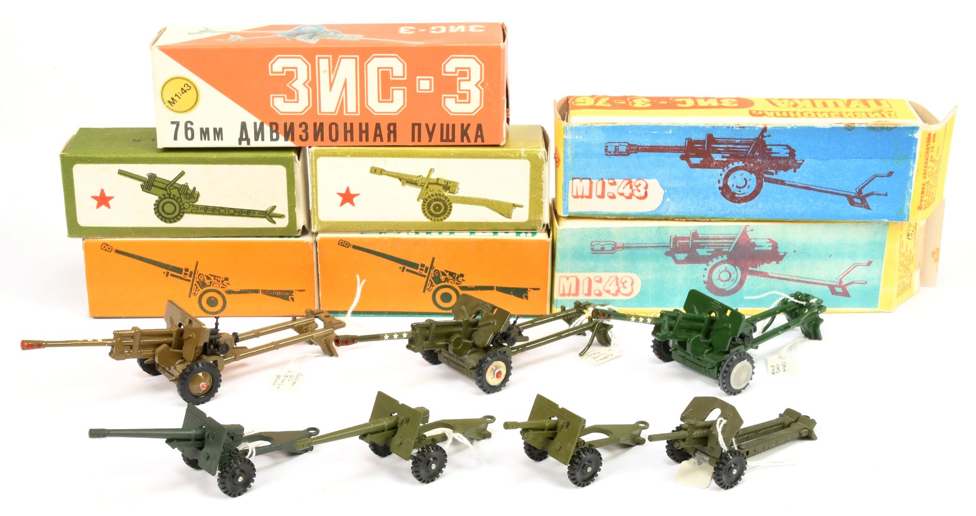 Russain made group of 7 field guns - to include 3 X (1/43rd) scale - brown including hubs