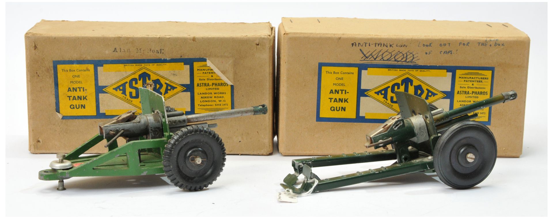 Astra Anti-Tank gun a pair (1) -  green, with black wheels and (2) same but Camouflage finish  - Image 2 of 2