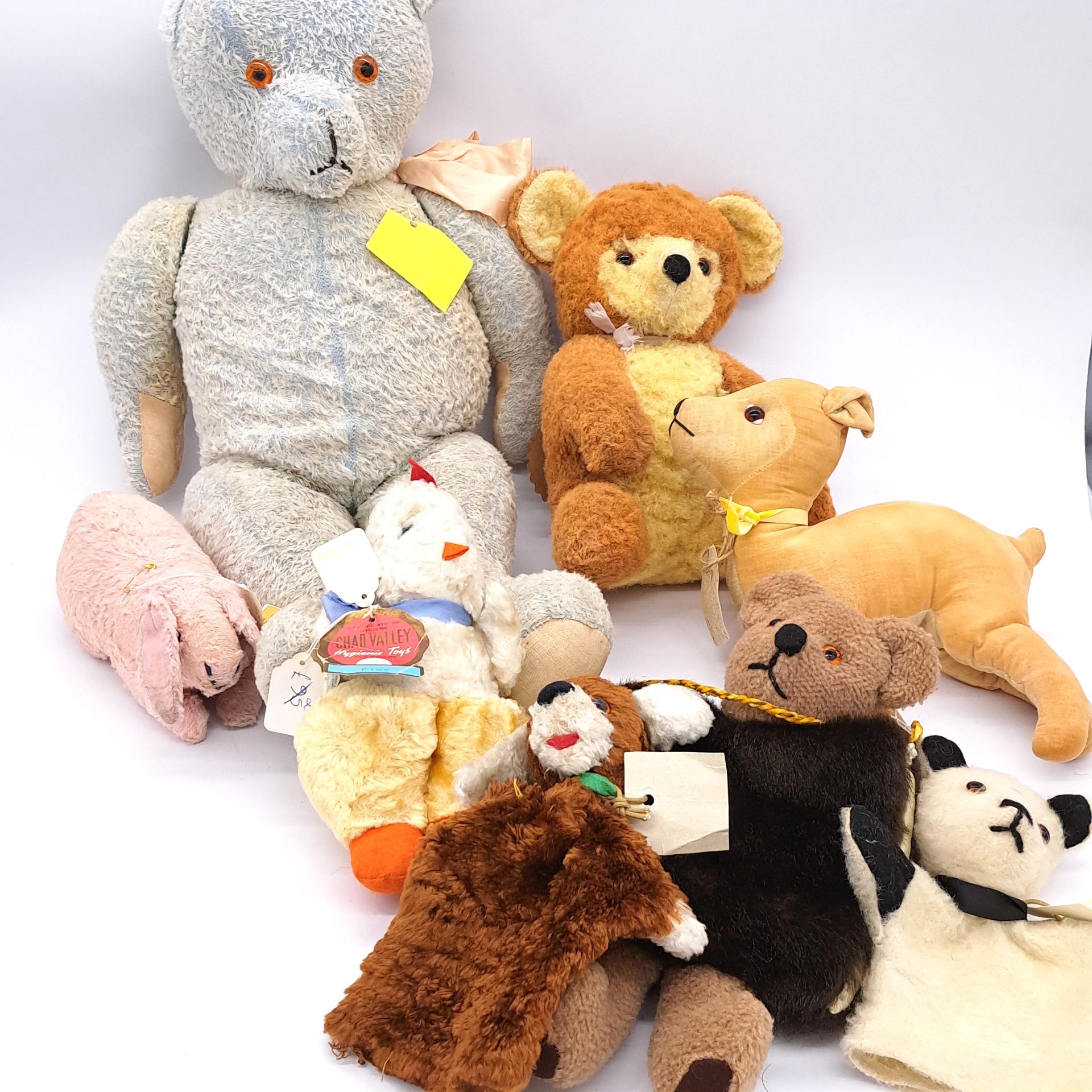 Assortment of vintage teddy bears/toys, including Chad Valley