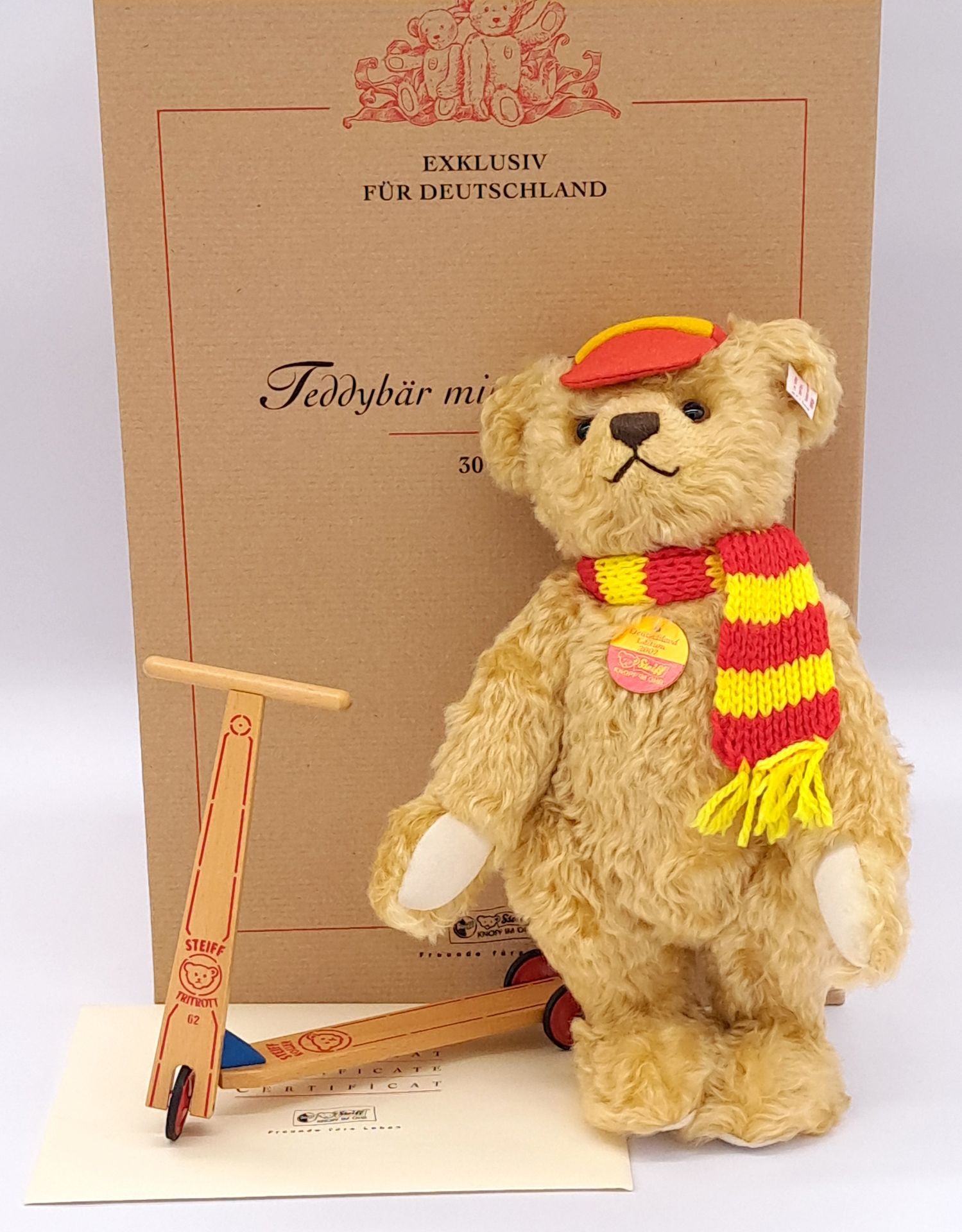 Steiff Teddy Bear with wooden Scooter