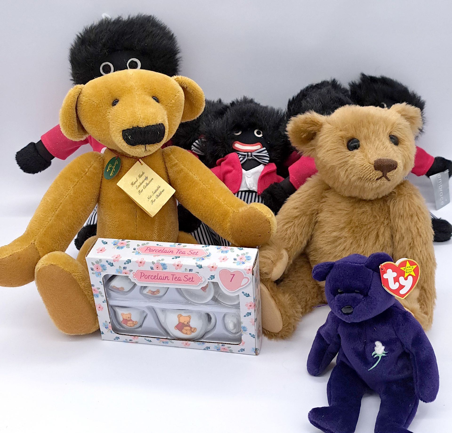 Assortment of teddy bears, gollies, and others; including Steiff Schnuffy