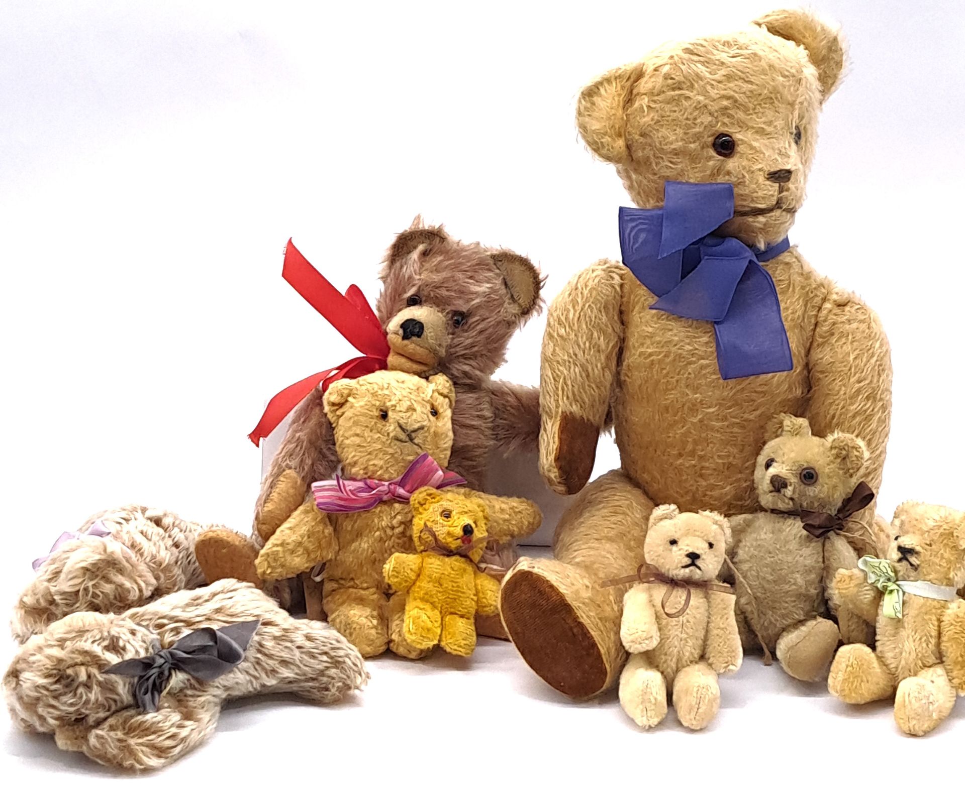 Collection of vintage European teddy bears, including 2x Steiff Sleeping Zotty