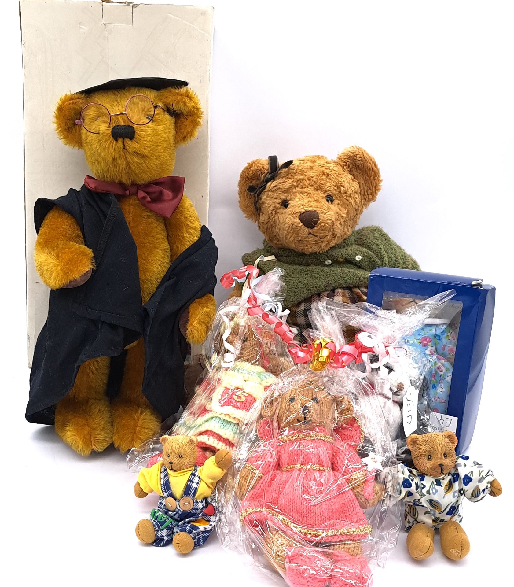 Assortment of modern and handmade teddy bears, including Past Times