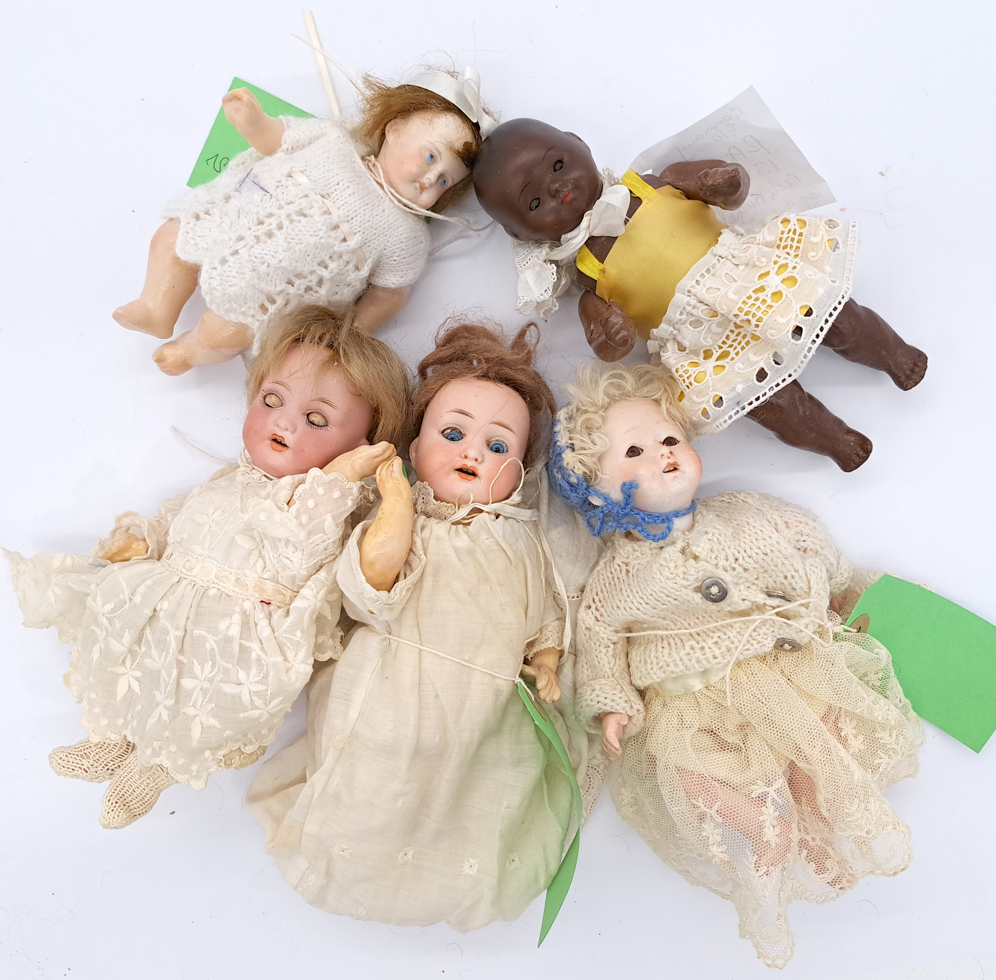 Assortment of bisque baby dolls