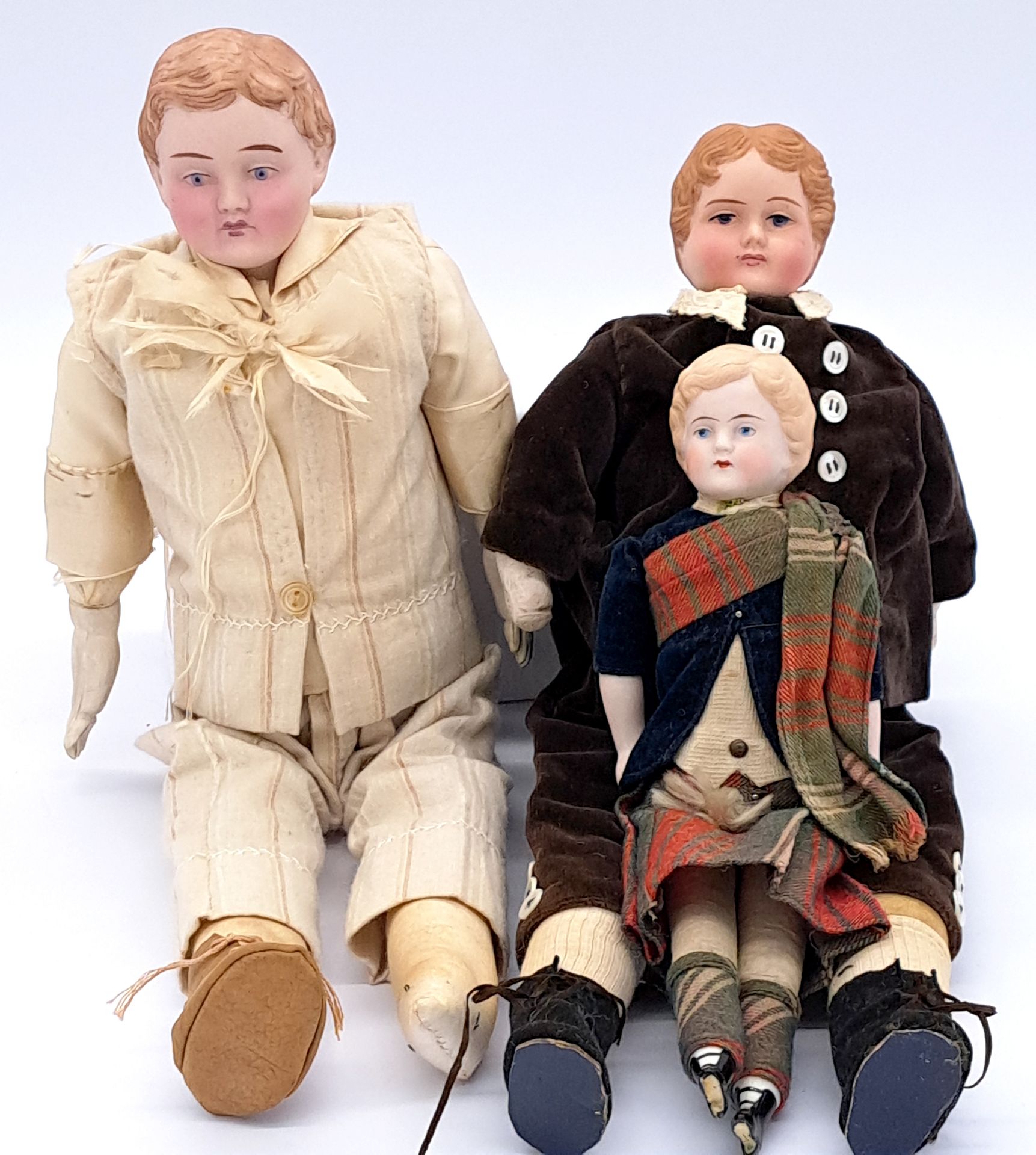 Trio of Parian shoulder head dolls