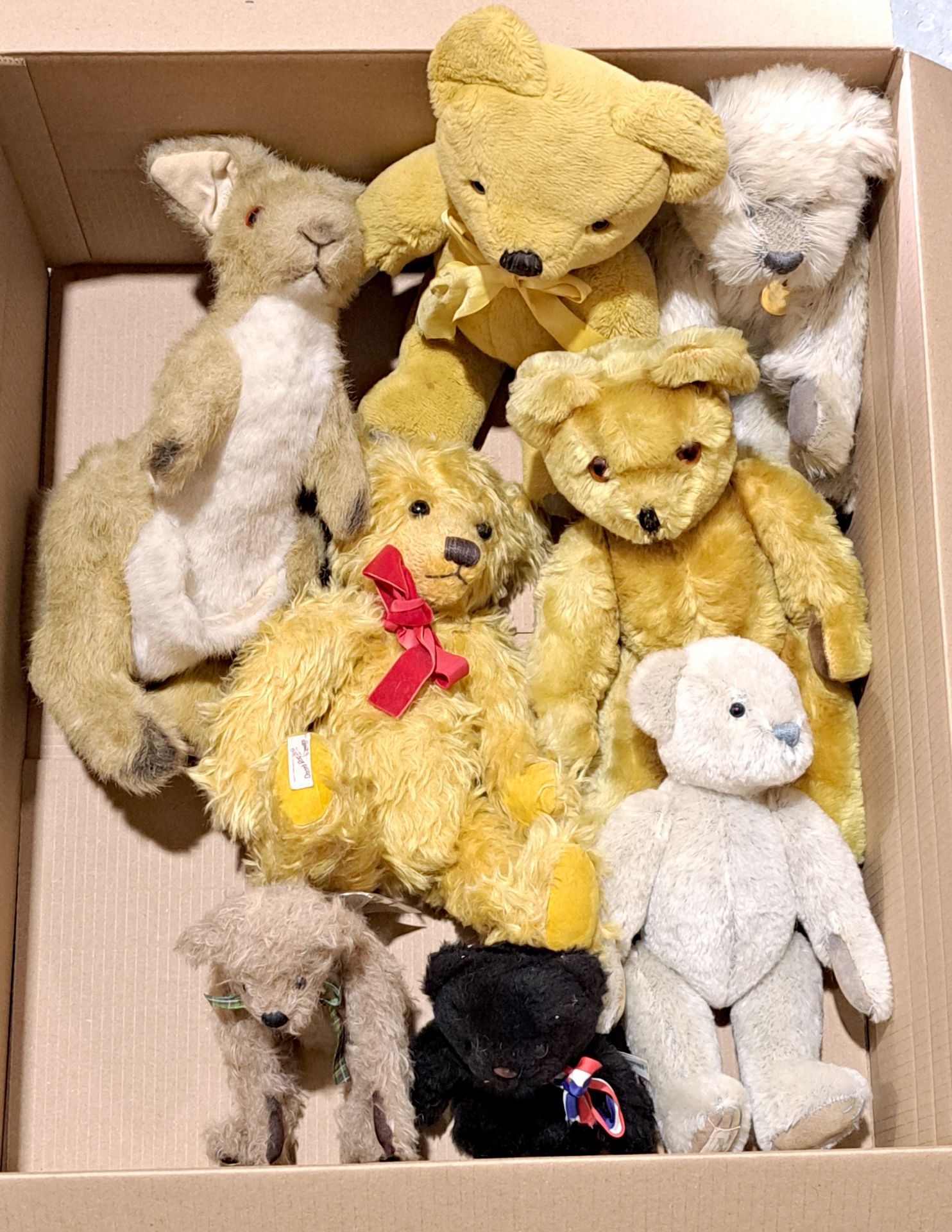 Collection of vintage and modern teddy bears, including Pedigree and Merrythought