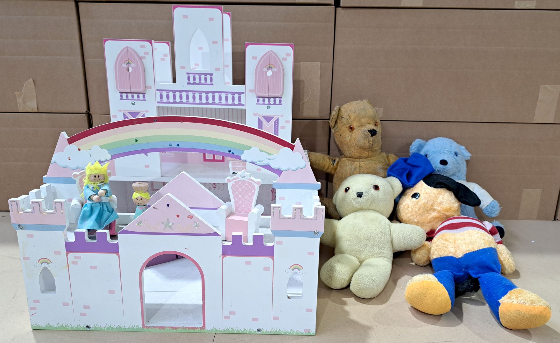 Wooden doll's castle and bears
