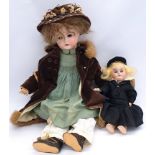 DEP pair of bisque dolls