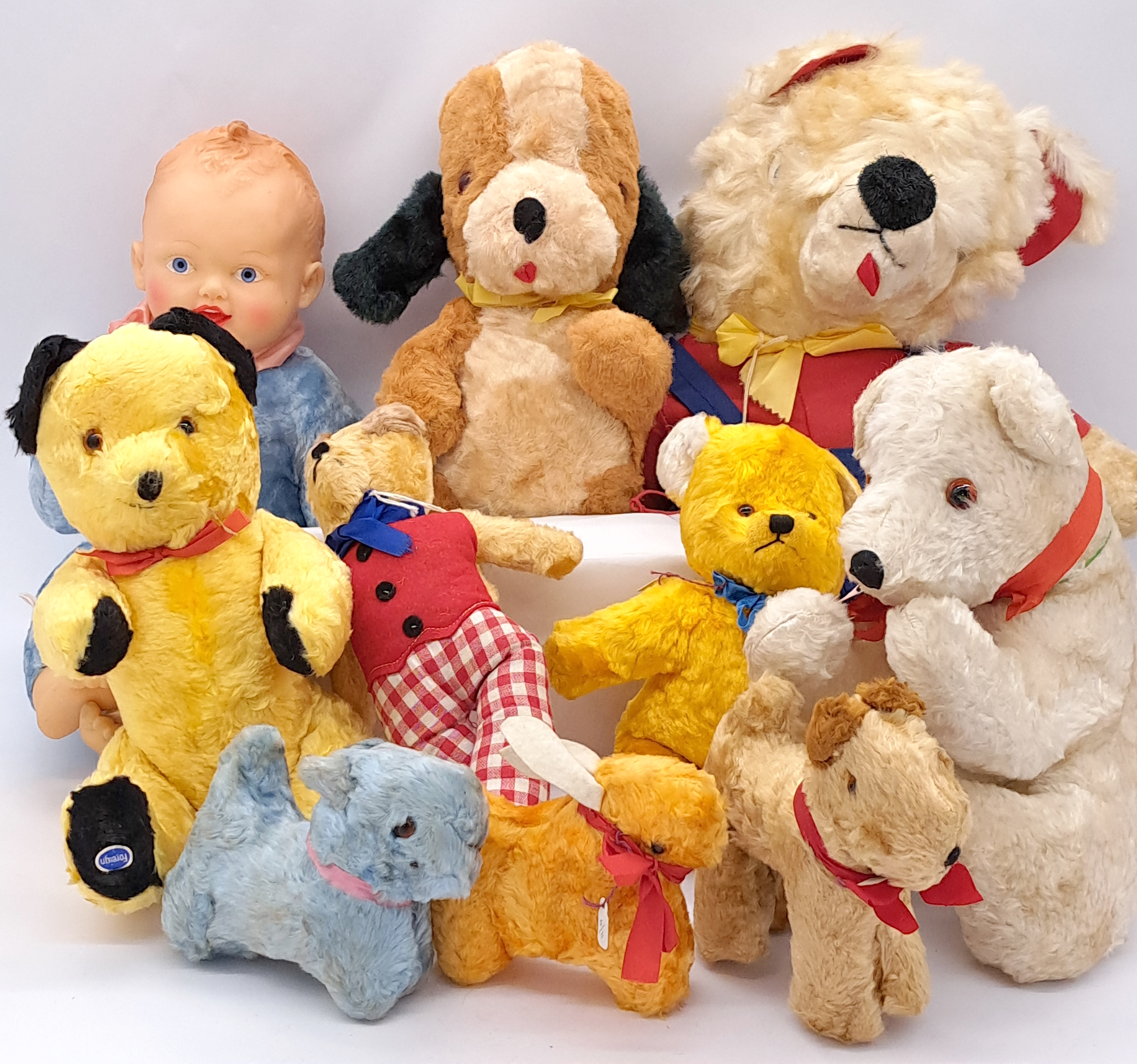 Assortment of artificial silk bears and toys