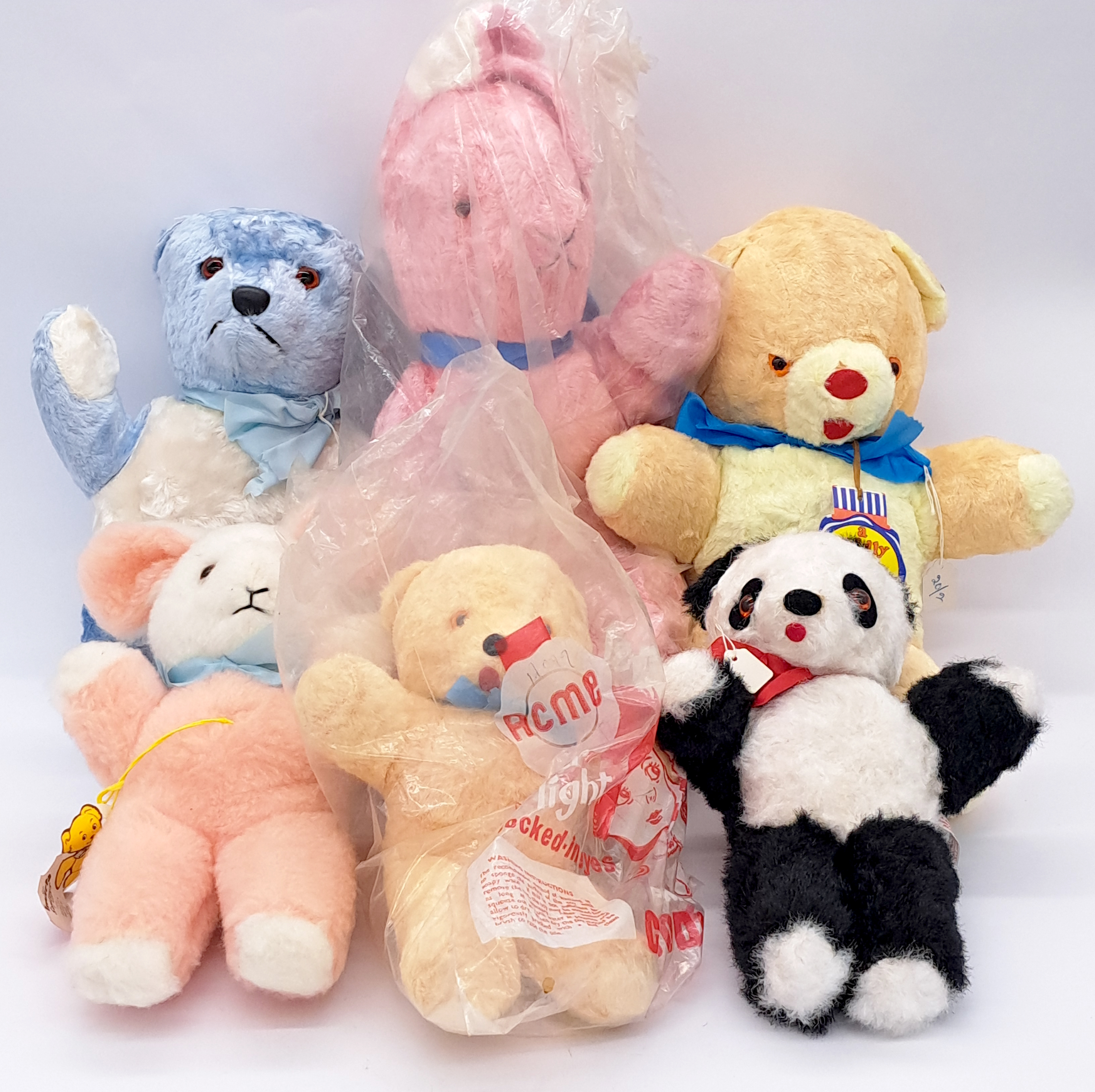 Assortment of vintage unjointed teddy bears, including Invicta and Acme