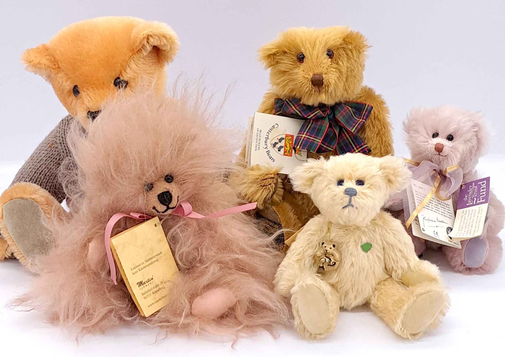 Assortment of teddy bears including Martin and Canterbury Bears