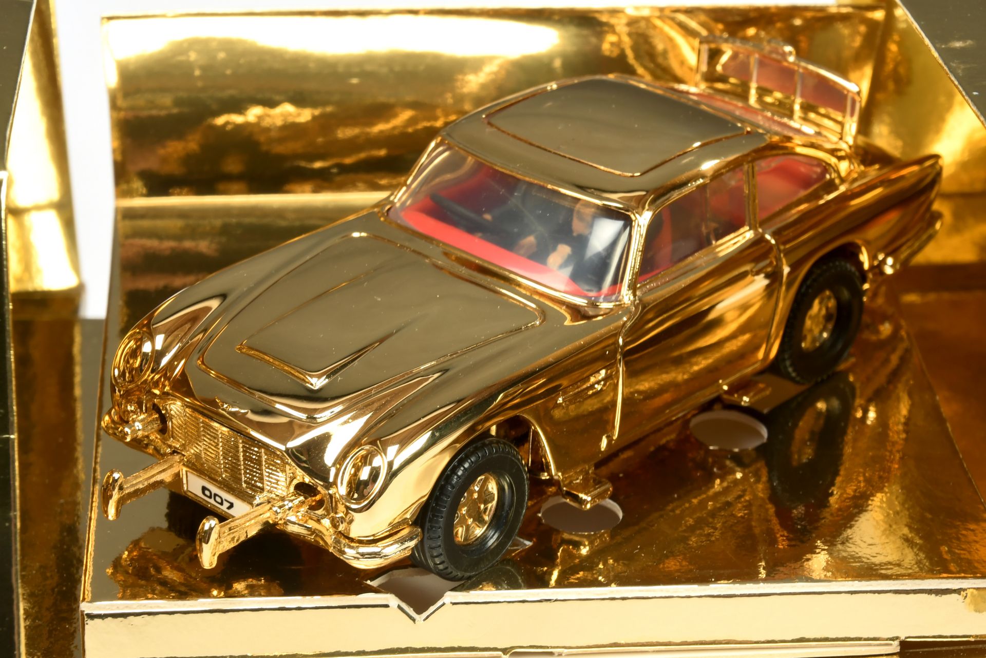 Corgi Toys "James Bond" Aston martin (1/36th scale) - Gold Plated issue with red interior and "Ja... - Image 7 of 8