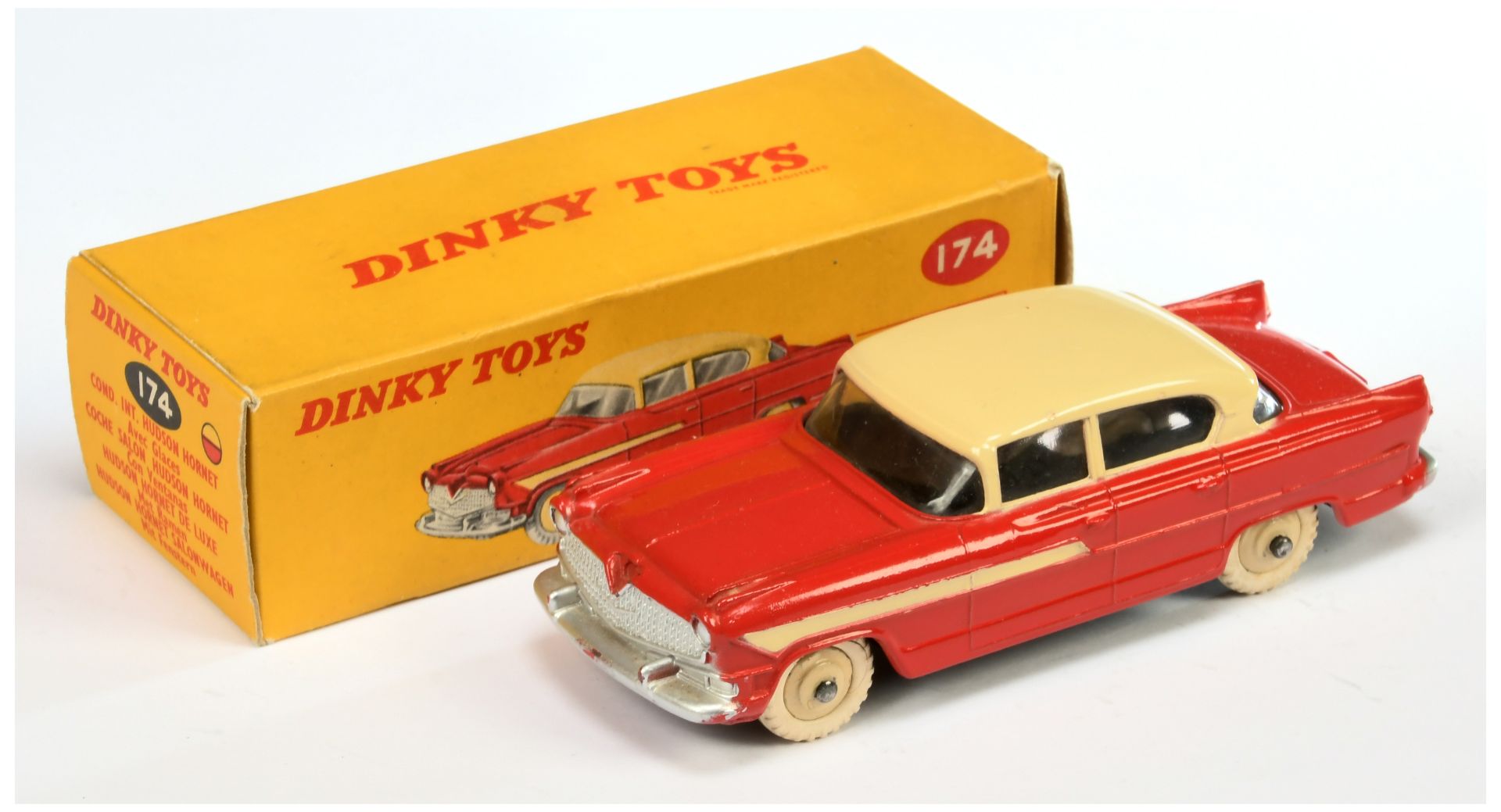 Dinky Toys 174 Hudson Hornet Sedan - Red body with cream roof and side flashes, silver trim and l...