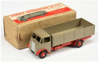 Dinky toys 511 Guy (type 1) 4-Ton Lorry Fawn cab and back, red chassis and rigid hubs, silver tri...