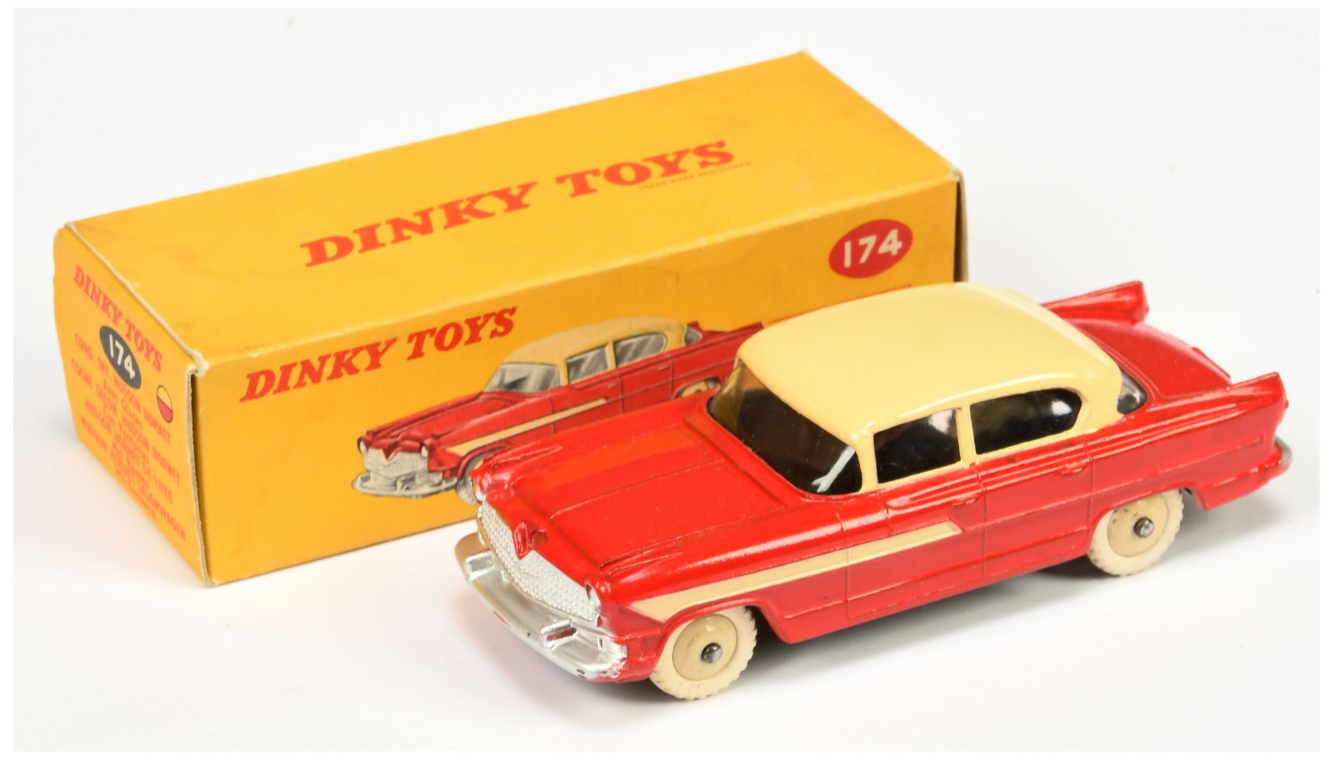 Dinky Toys 174 Hudson Hornet Sedan - Red body with cream roof and side flashes, silver trim and l...