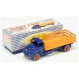 Dinky Toys 931 (531) Leyland Comet Lorry - Blue cab and chassis , deep yellow stake back, red sup...