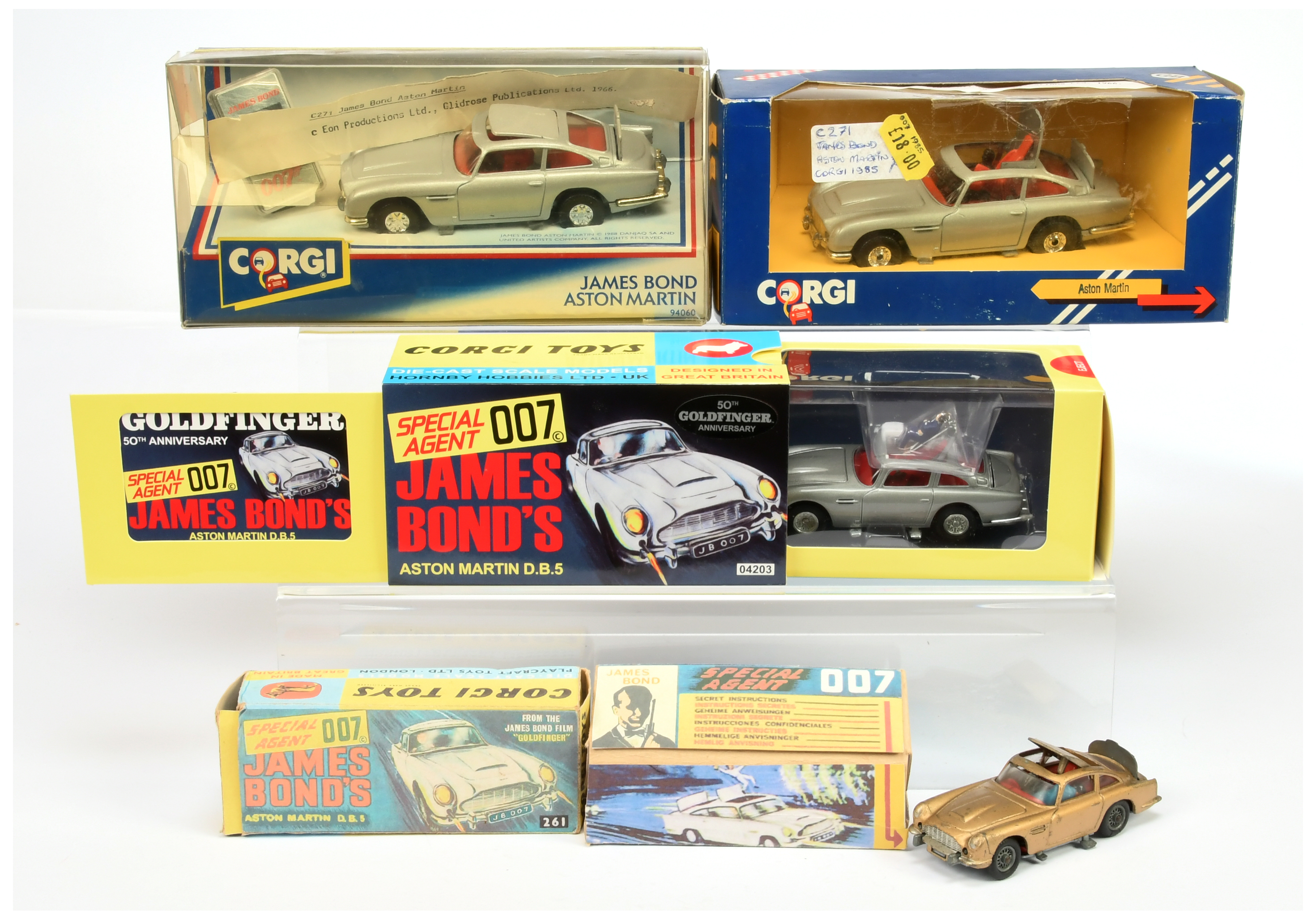 Corgi Toys "James Bond" Group Of 4 To Include - 04203 Aston Martin (1/43rd) "Goldfinger" - Silver...