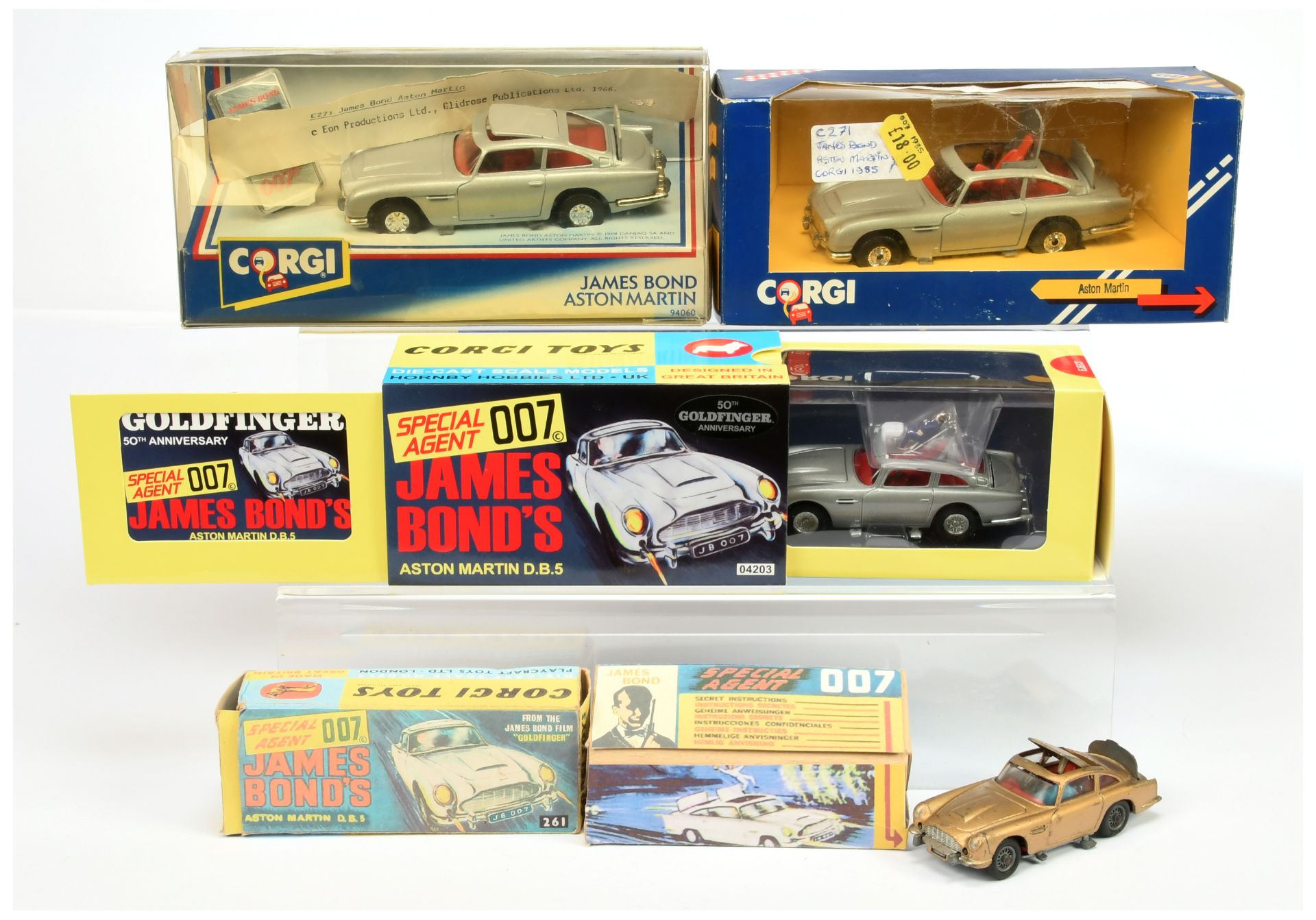 Corgi Toys "James Bond" Group Of 4 To Include - 04203 Aston Martin (1/43rd) "Goldfinger" - Silver...