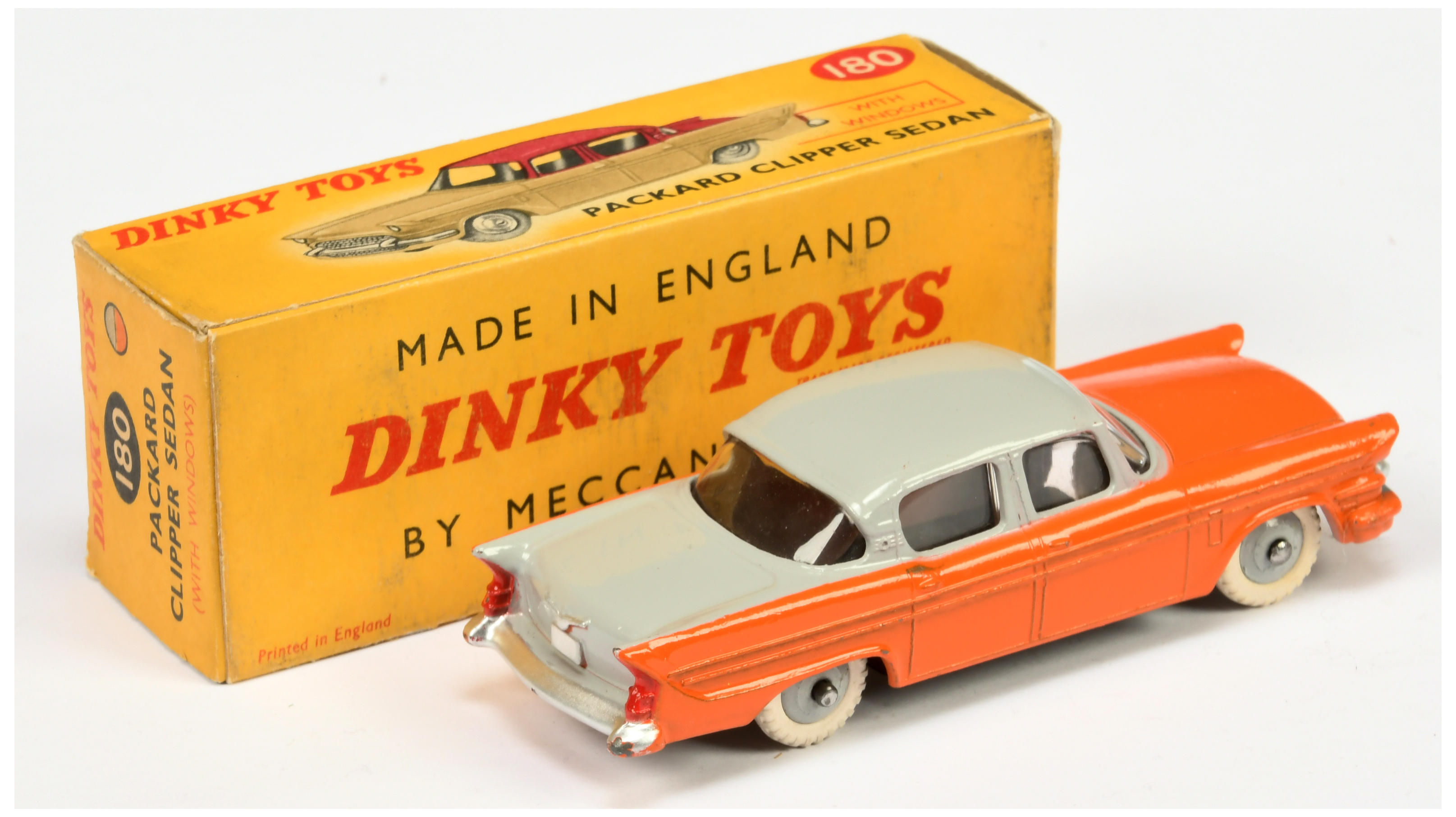 Dinky Toys 180 Packard Clipper Sedan - Two-Tone orange and grey including rigid hubs with white t... - Image 2 of 2
