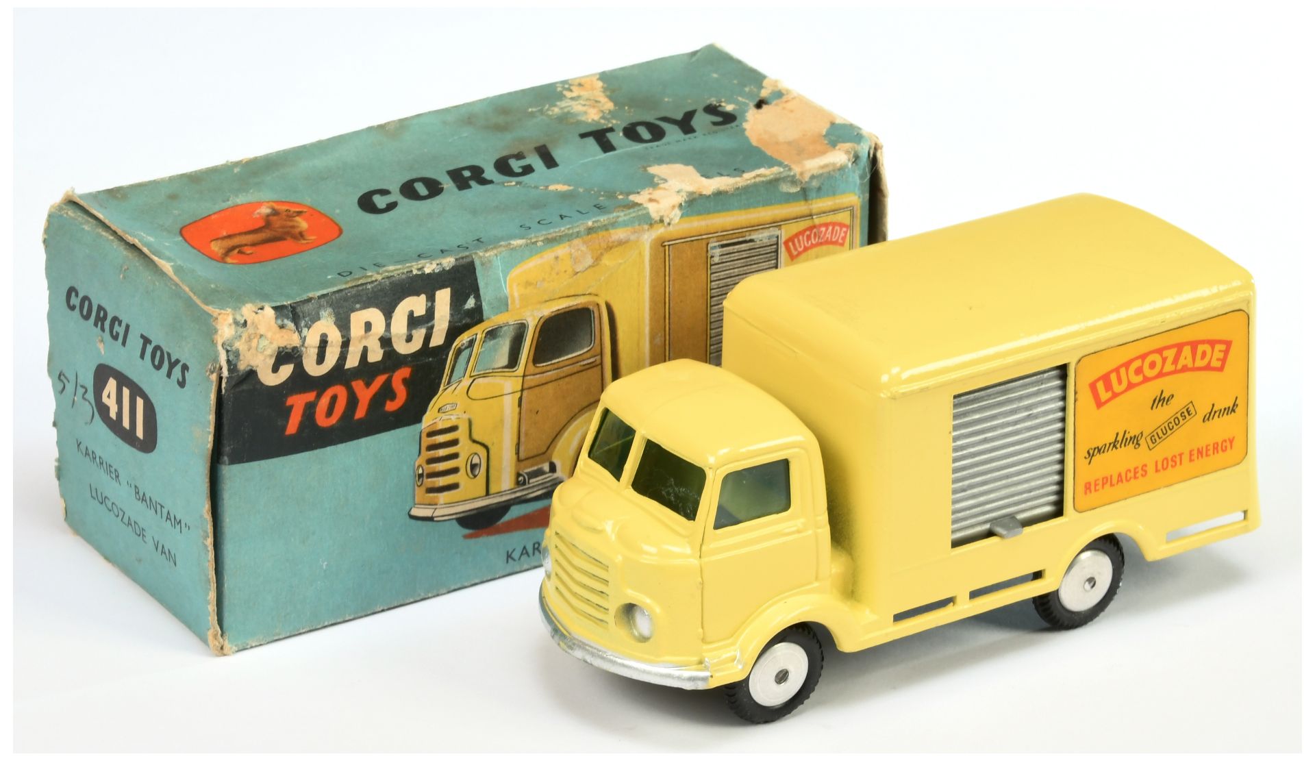 Corgi Toys 411 Smiths Karrier "Lucozade" - Yellow, body grey side opening door, silver trim and f...