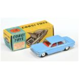 Corgi Toys 229 Chevrolet Corvair -  Blue body, red interior, silver trim and flat spun hubs