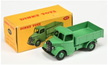 Dinky Toys 411 Bedford Open back truck  - Mid-green Body, chassis, back and rigid hubs with smoot...