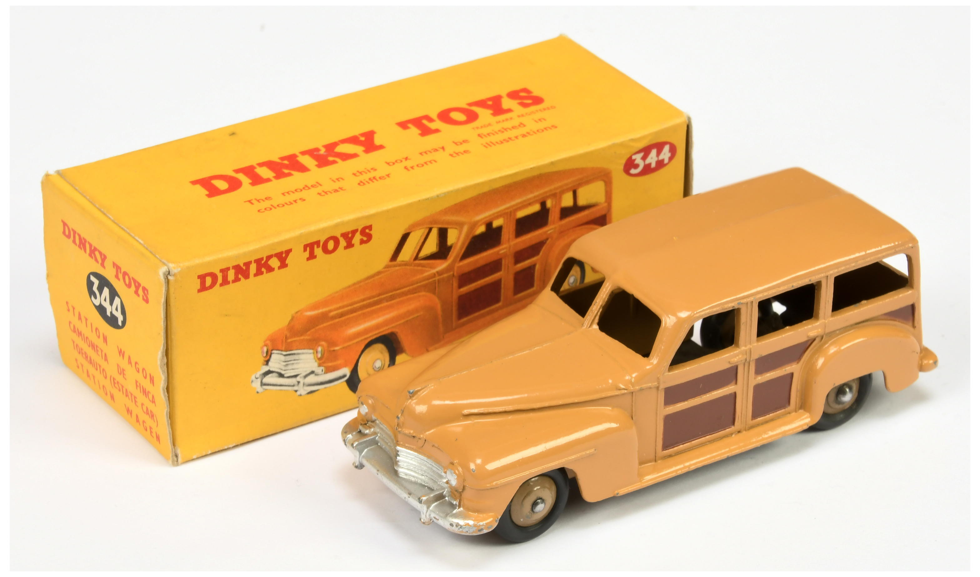 Dinky Toys 344 Plymouth Estate Car - Tan body, brown side and rear panels, silver trim and fawn r...