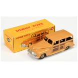 Dinky Toys 344 Plymouth Estate Car - Tan body, brown side and rear panels, silver trim and fawn r...