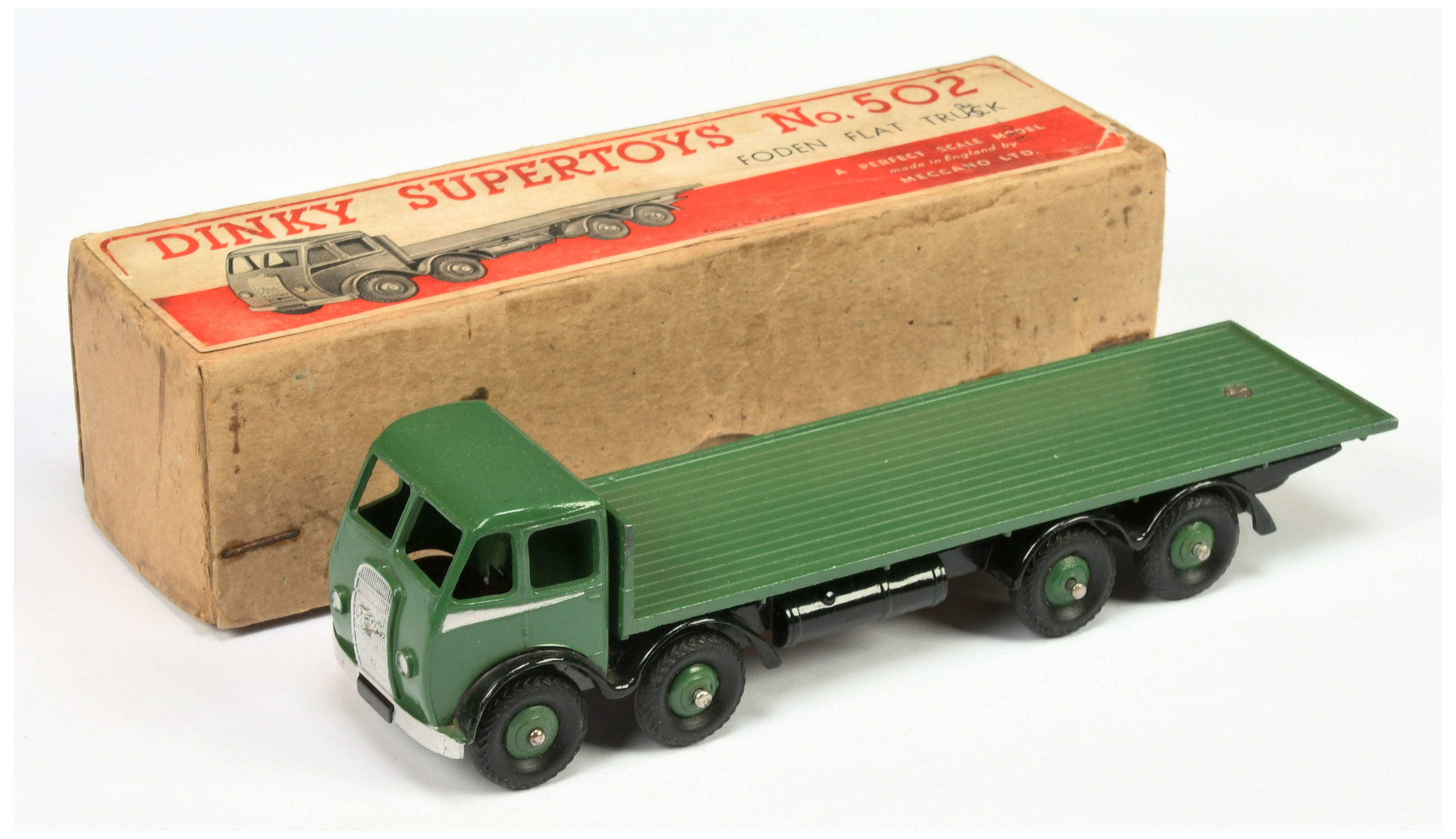 Dinky Toys 502 Foden (type 1) Flat Truck - Green cab, back and rigid hubs with herringbone tyres,...