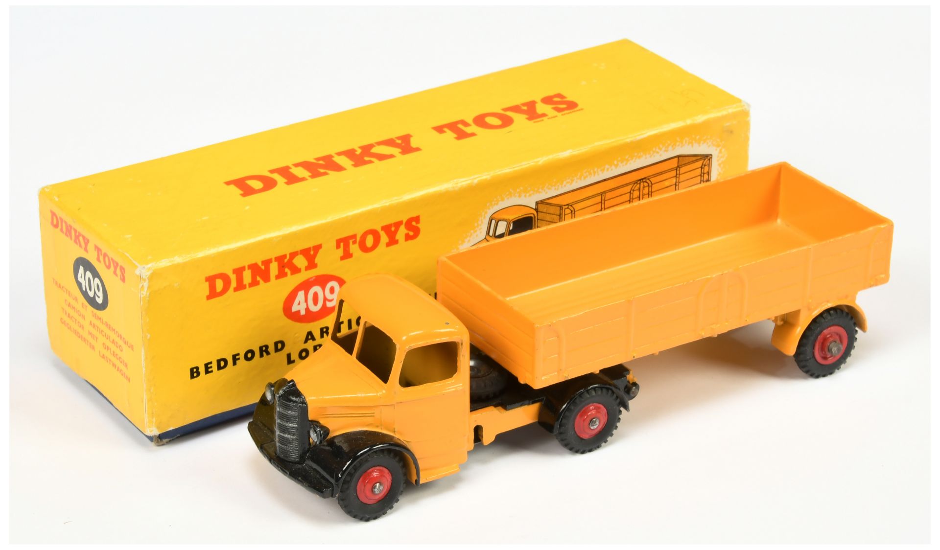 Dinky Toys 409 Bedford Articulated truck And trailer - Deep yellow, black, red rigid and supertoy...