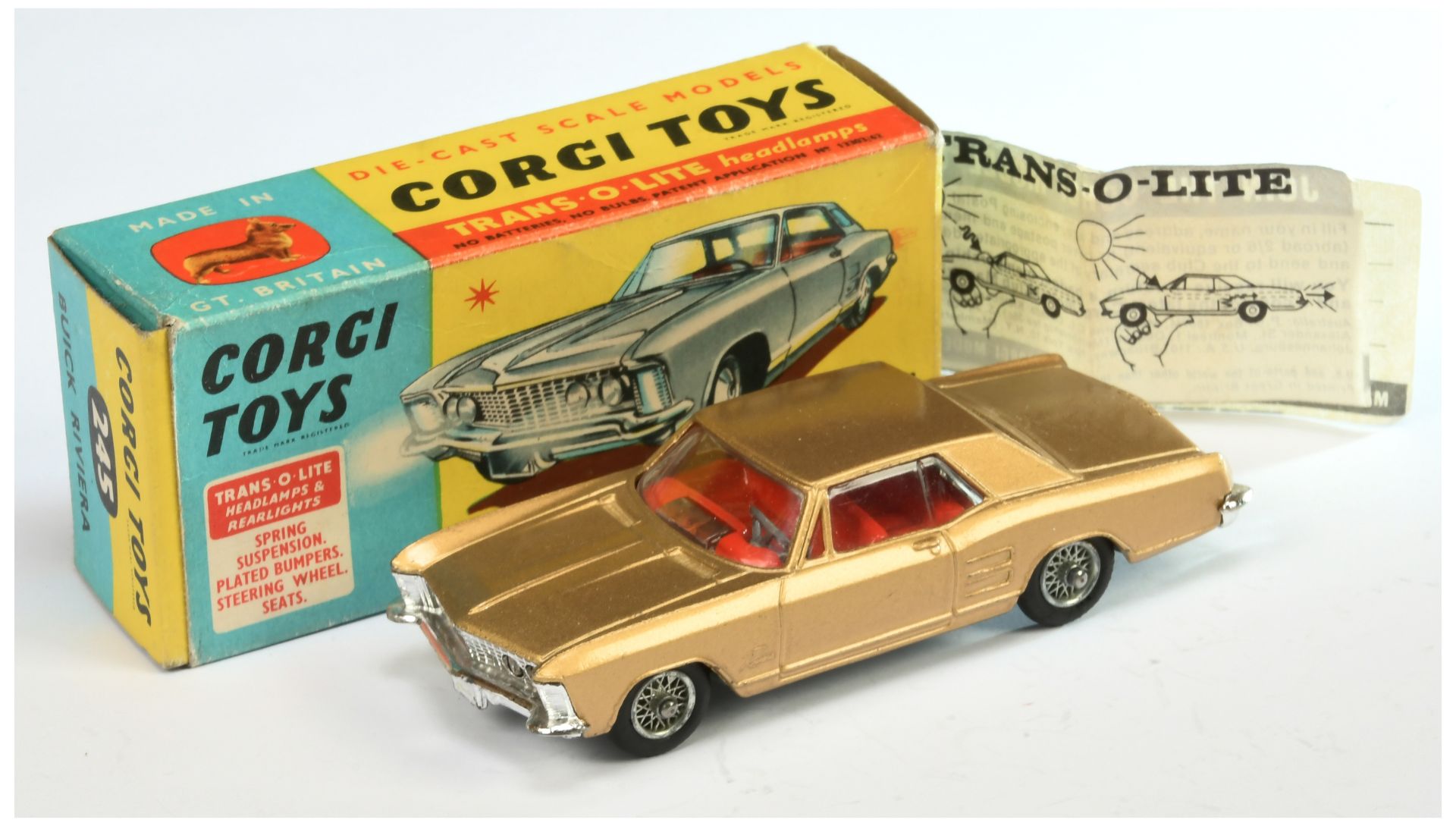 Corgi Toys 245 Buick Riviera - Gold body, red interior, chrome trim, wire wheels and grey plastic...