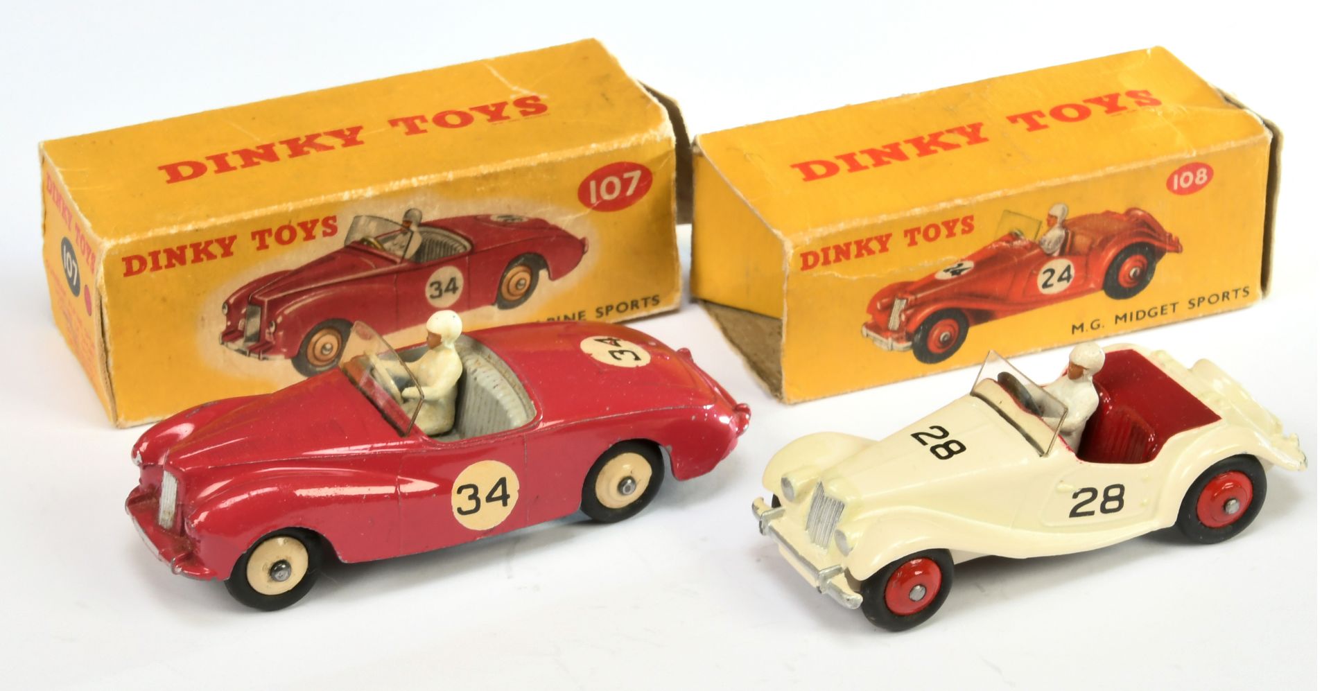 Dinky Toys 107 Sunbeam Al;pine sports - Cerise body, grey interior with figure, silver trim and l...