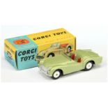 Corgi Toys 305 Triumph TR3 Sports Car - Light green body,  red seats, silver trim and flat spun hubs