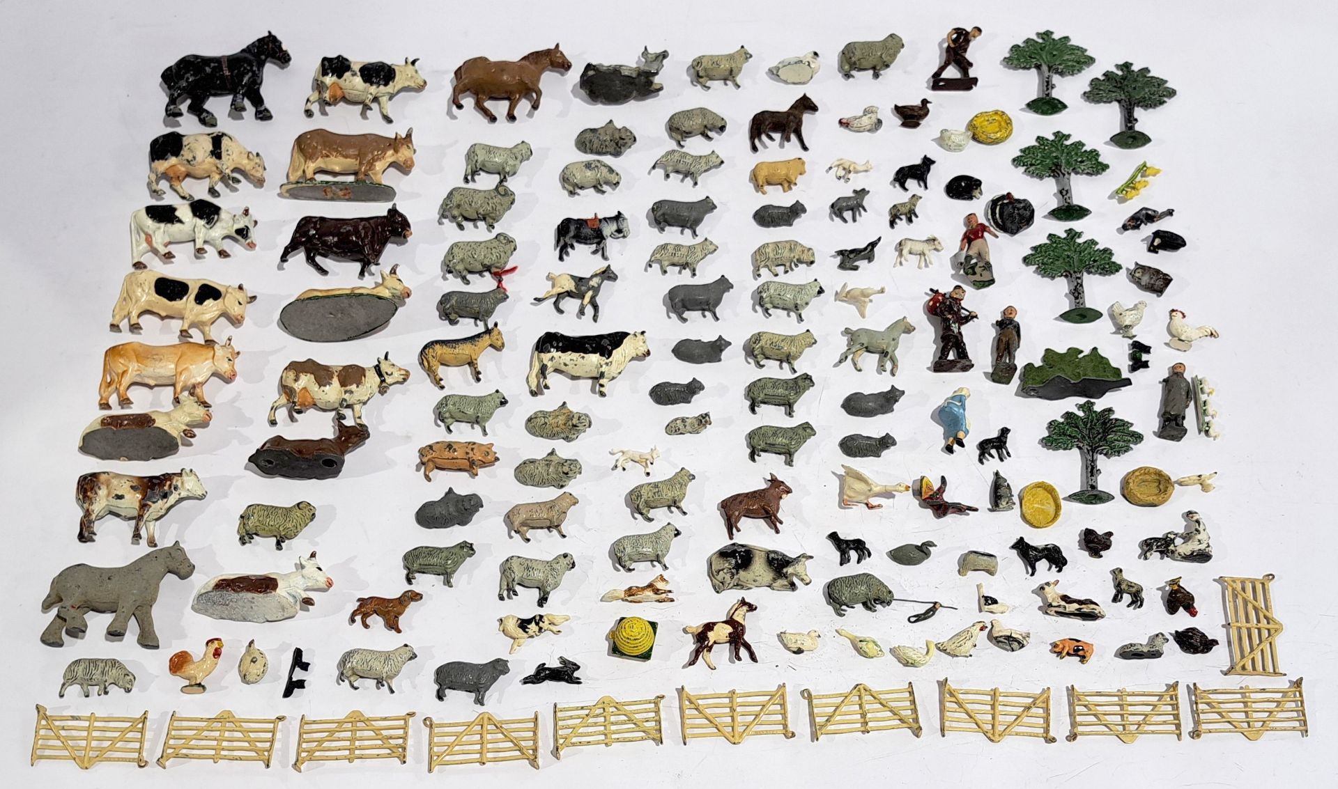 Britains & similar, an unboxed group of lead & plastic agricultural related, farmyard animals & s...