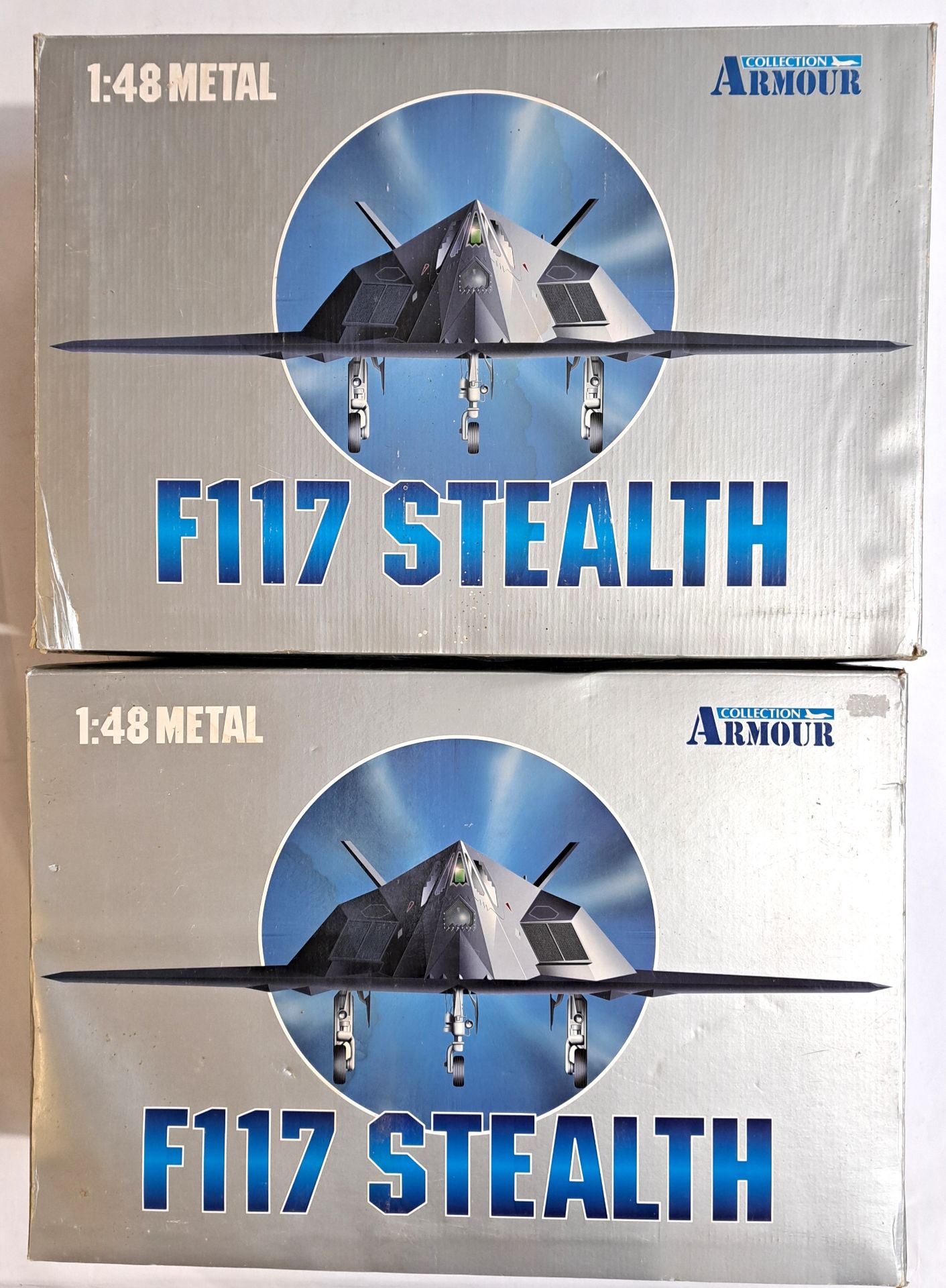 Franklin Mint  "Armour Collection", a boxed pair of 1:48 scaleF117 Stealth Fighter Jets