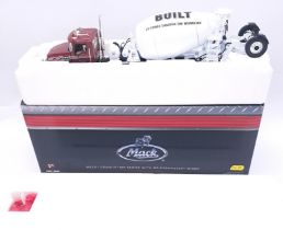 First Gear, a boxed 1:34 scale Mack Truck - Mack Granite MP Series With Bridgemaster Mixer