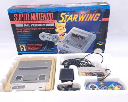 Super Nintendo, a boxed STARWING FX Entertainment System