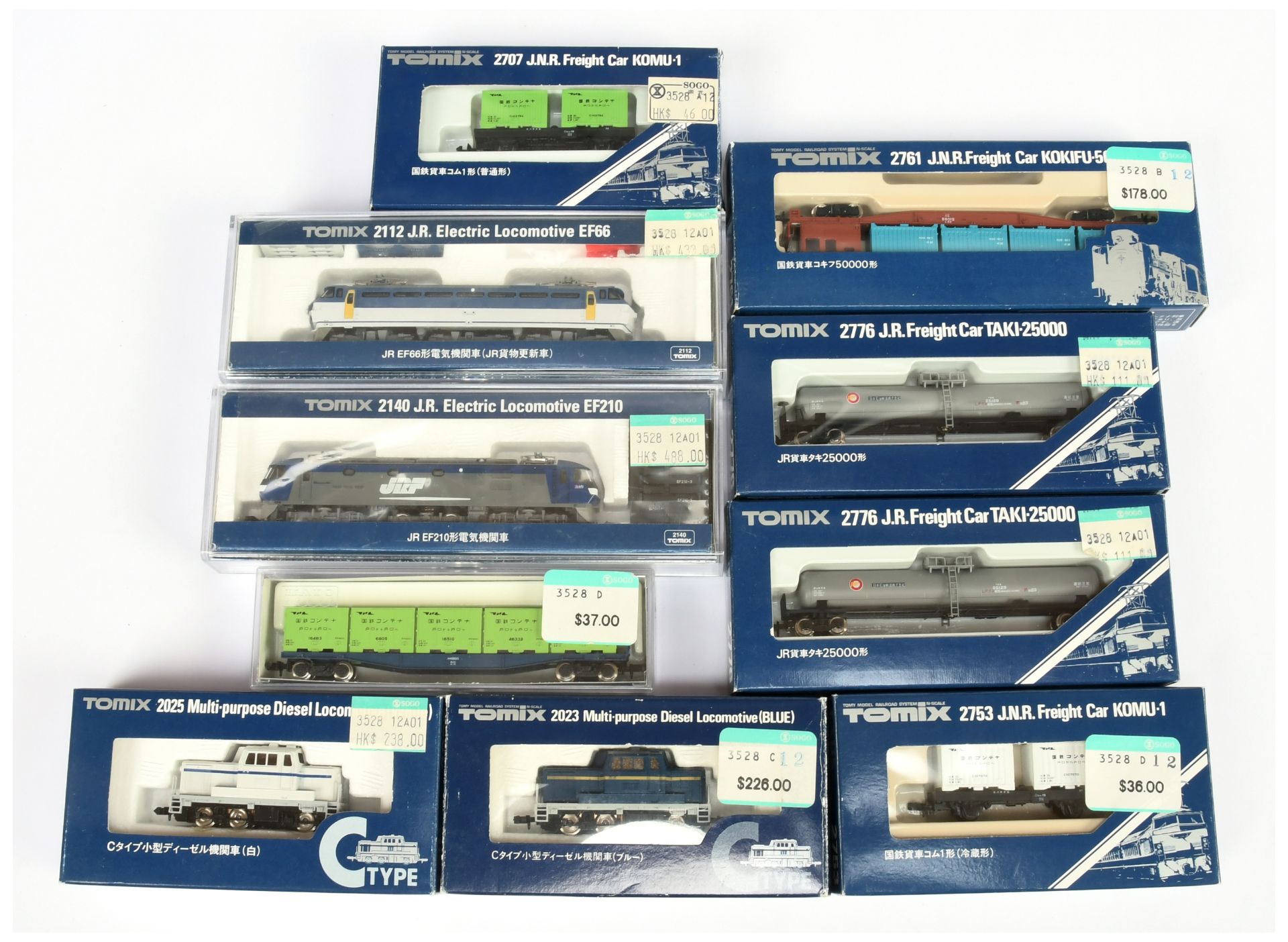 Tomix & Similar group of Diesel Locomotive and Rolling Stock to include 