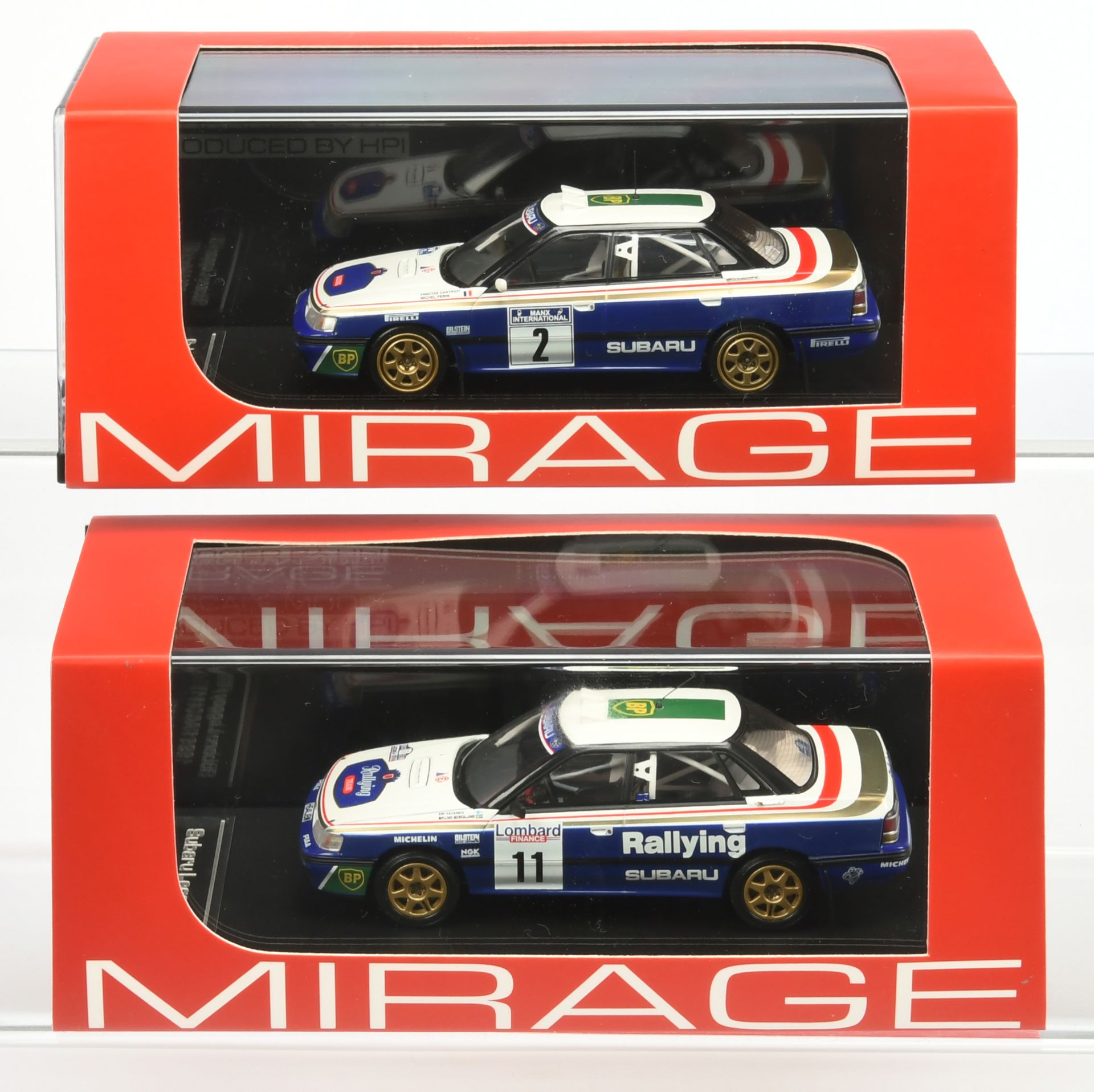 Pair of Mirage model cars -