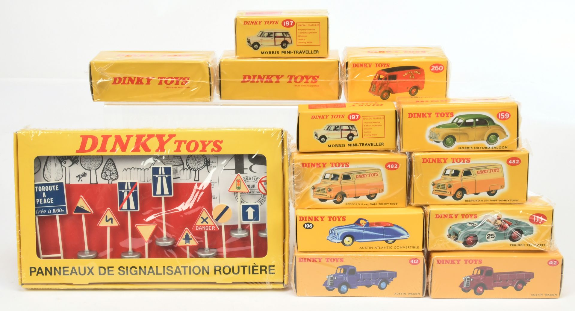 Dinky (Atlas Editions) - a boxed group of cars and accessories 