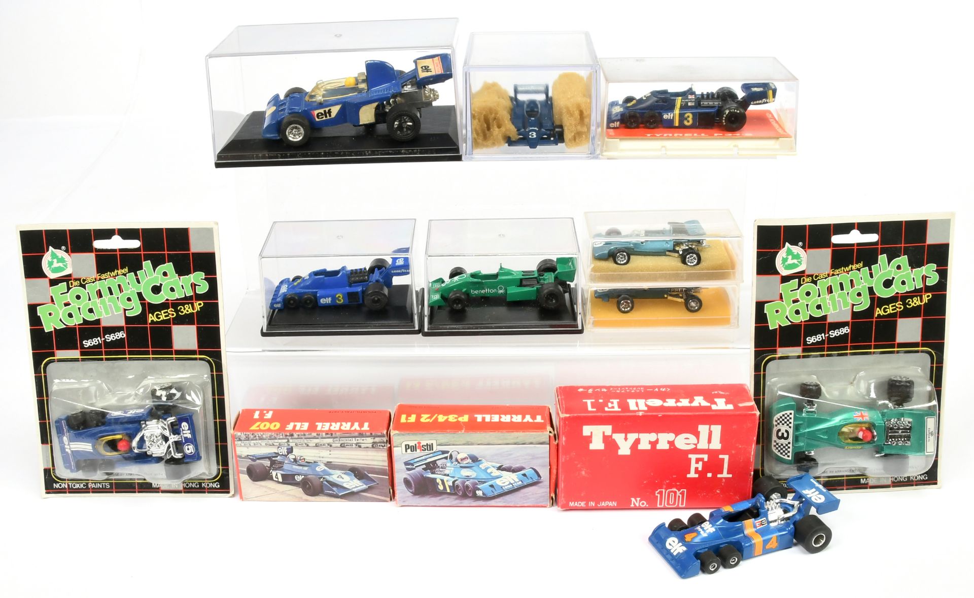 Mixed small scale group of racing cars.