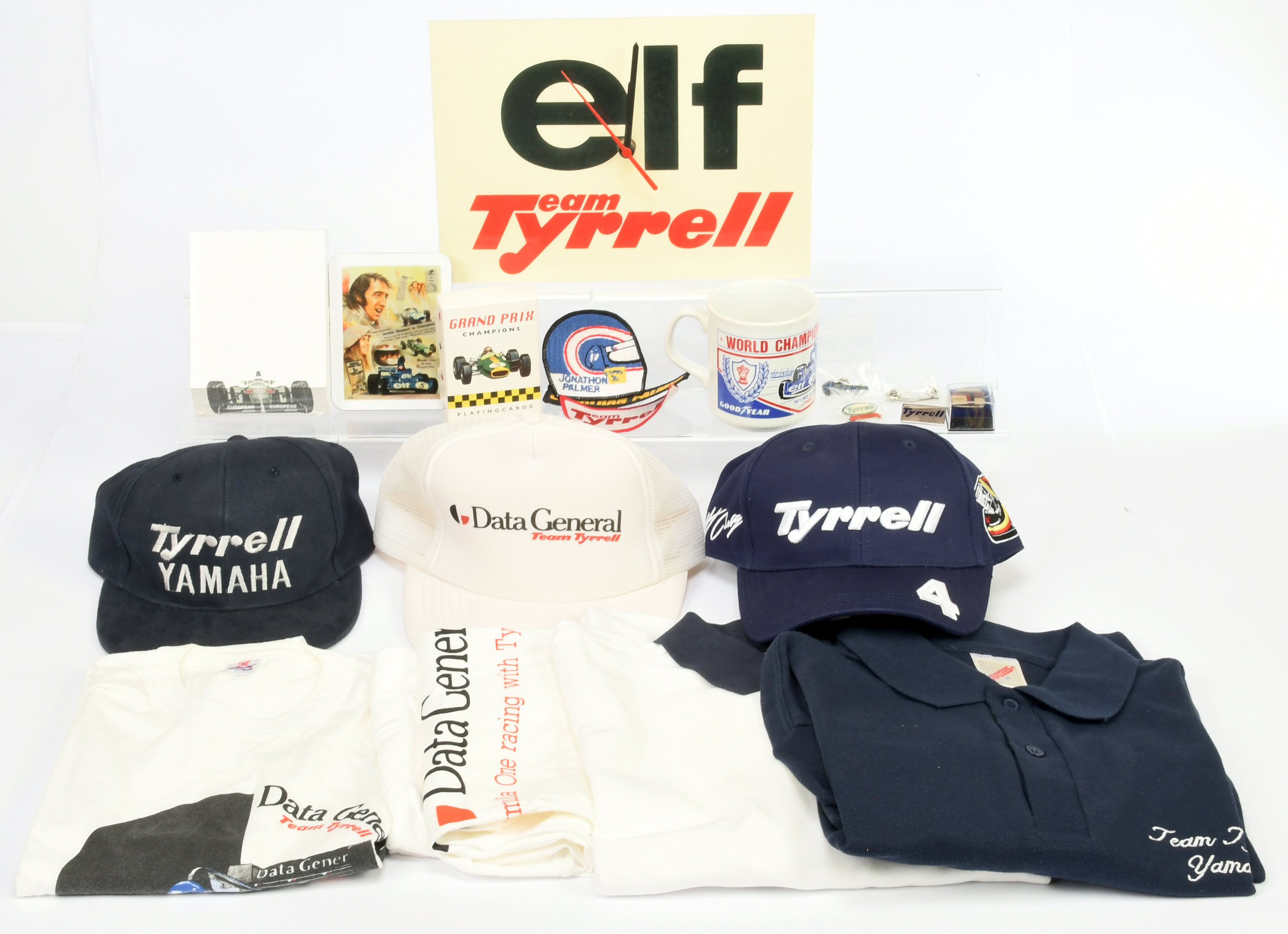 Tyrrell Mixed group of items to include T-shirts, caps and other items plus wall clock -