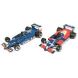 Pair of unboxed Racing Cars both racing number 4 - Candy Good Year Jarier 