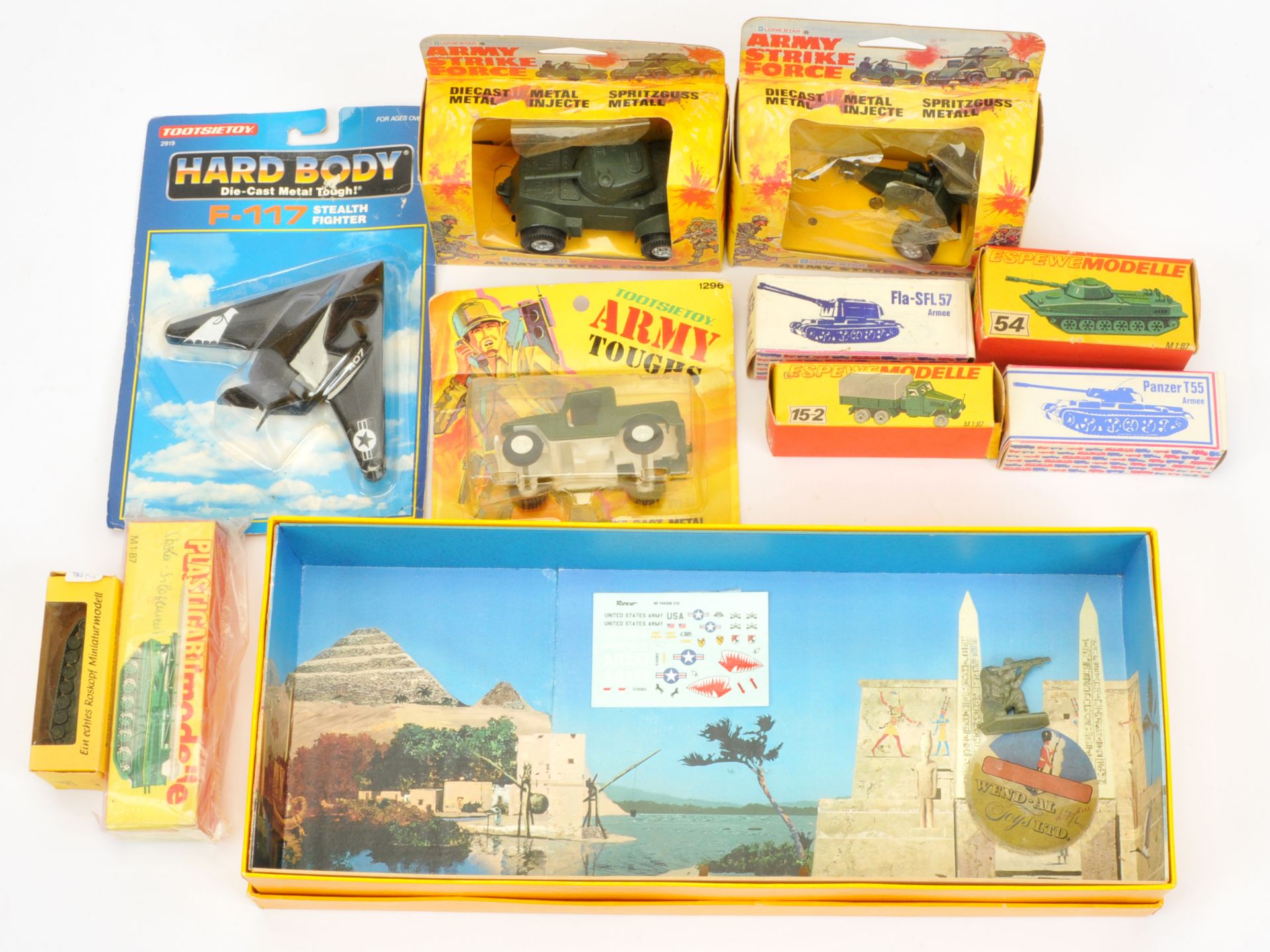 A Mixed Group of Plastic & Metal Military Vehicles