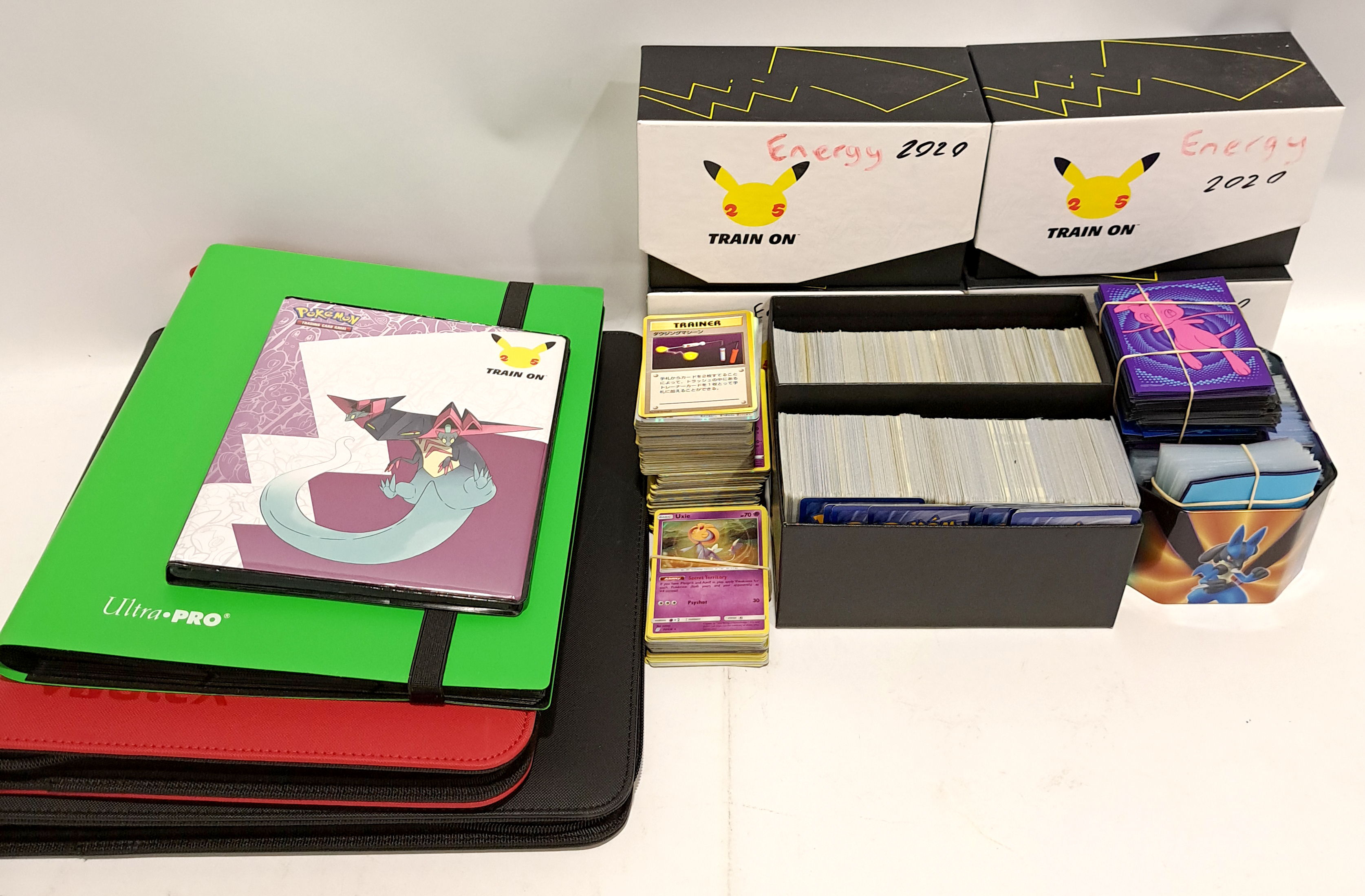 Large Quantity of Pokémon Trading Cards & Accessories