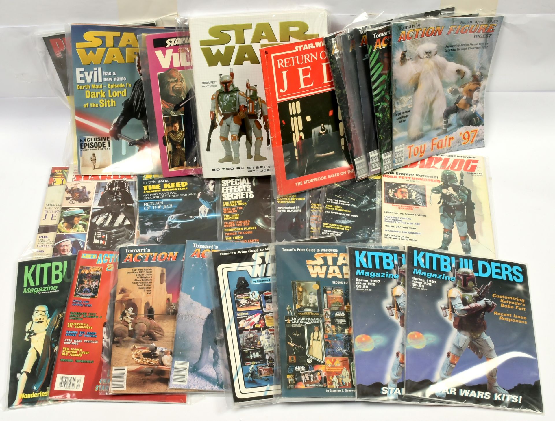 Books and magazines relating to Star Wars, Predator, etc