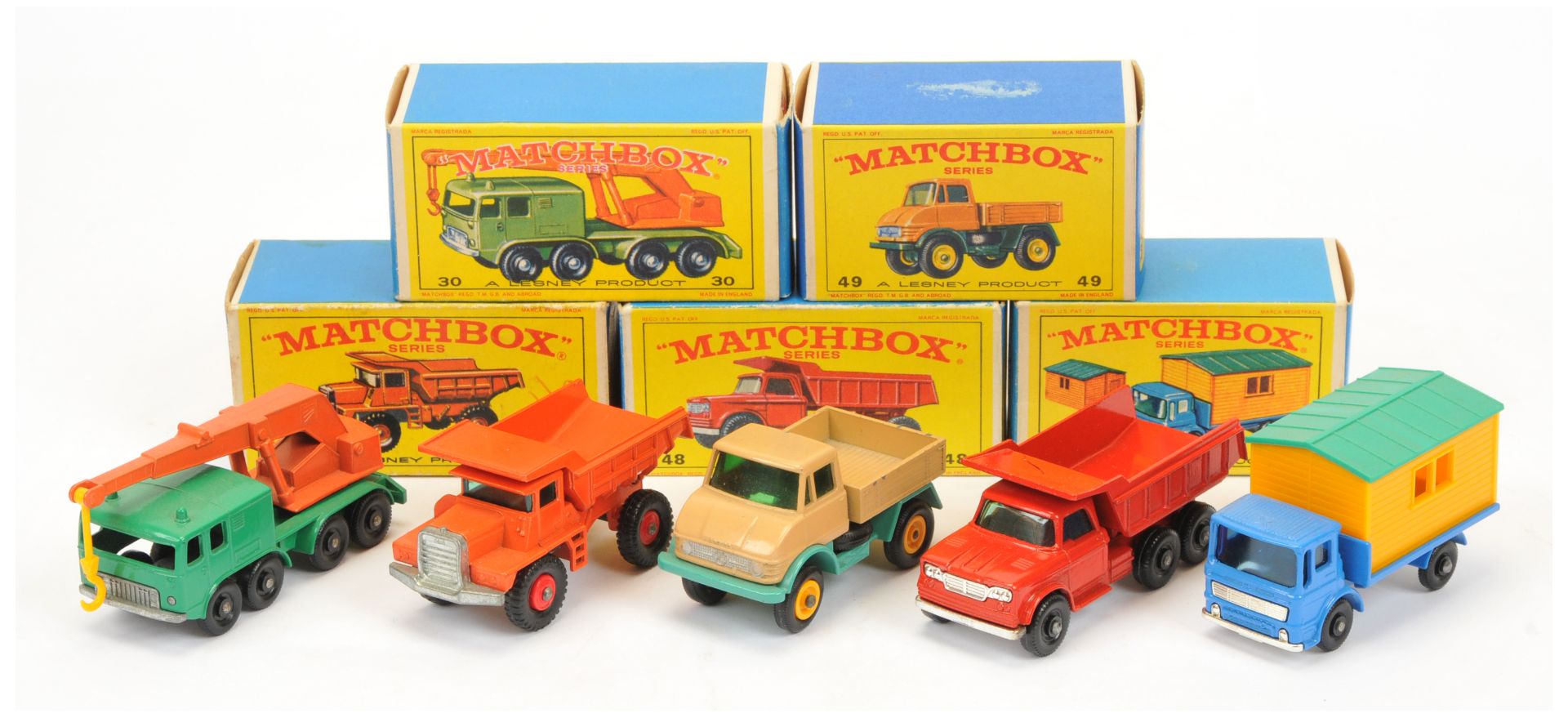 Matchbox Regular Wheels group (1) 28d Mack Dumper - orange cab, chassis and tipper, red plastic h...