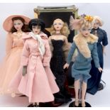 Collection of Gene and Madra dolls, plus outfits