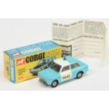 Corgi Toys 506 Sunbeam Imp "Police" Car - Light blue body with white roof band and doors, brown i...