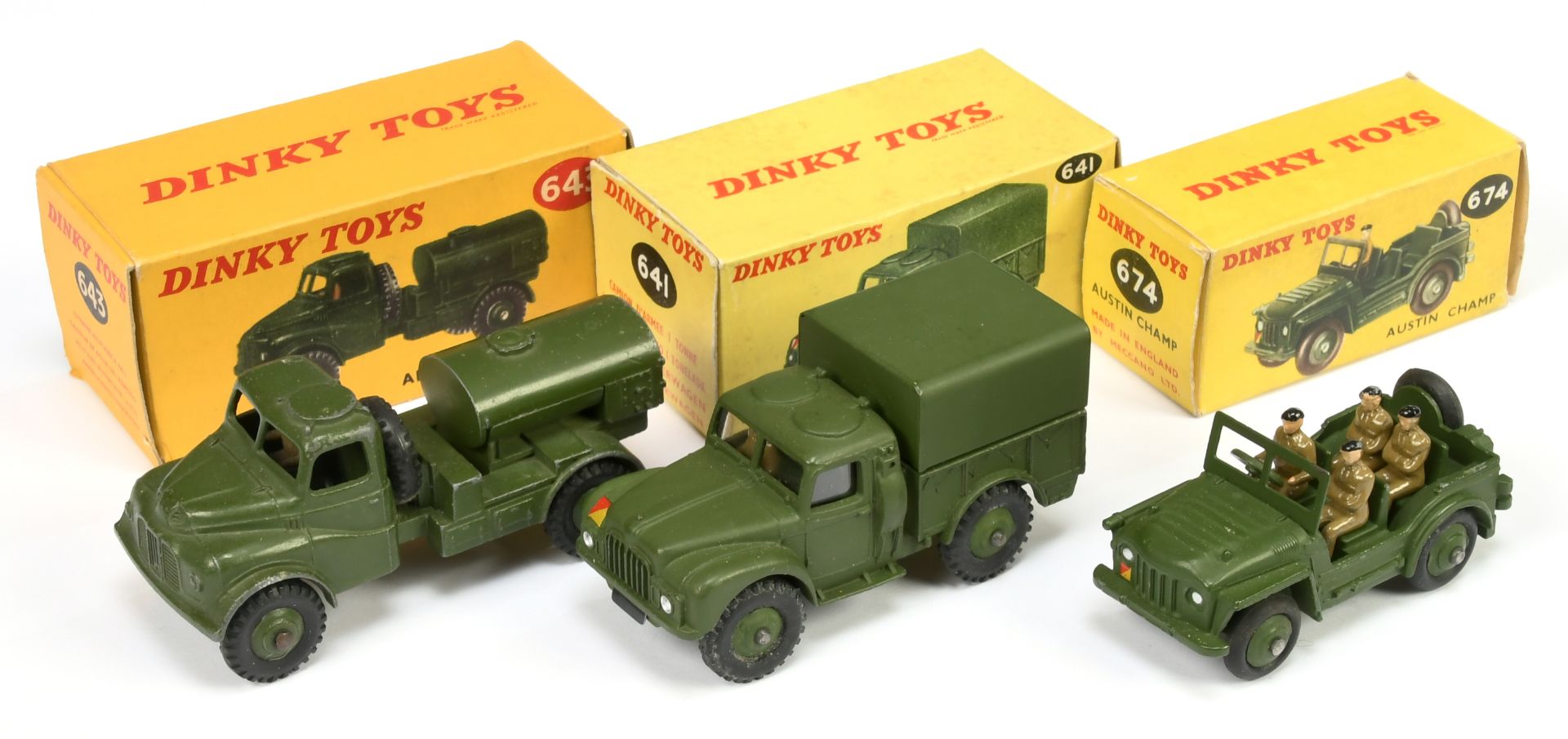 Dinky Toys Military Group Of 3 - (1) 641 Cargo 1-Ton Truck with windows, (2) 643 Austin water tan...